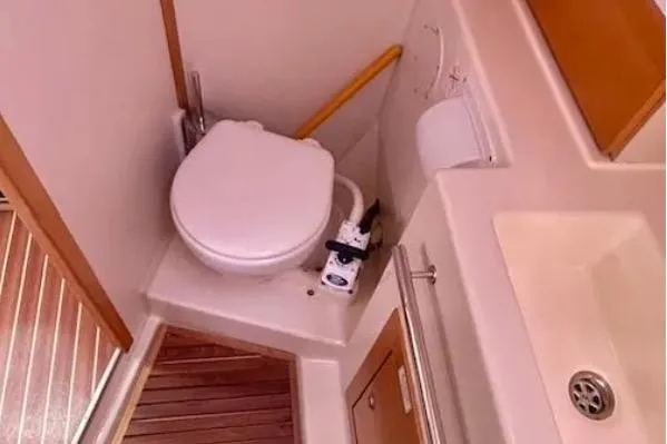 Slide: The Image of Compact bathroom in 2007 Hanse 400 yacht with toilet and sink. - 17