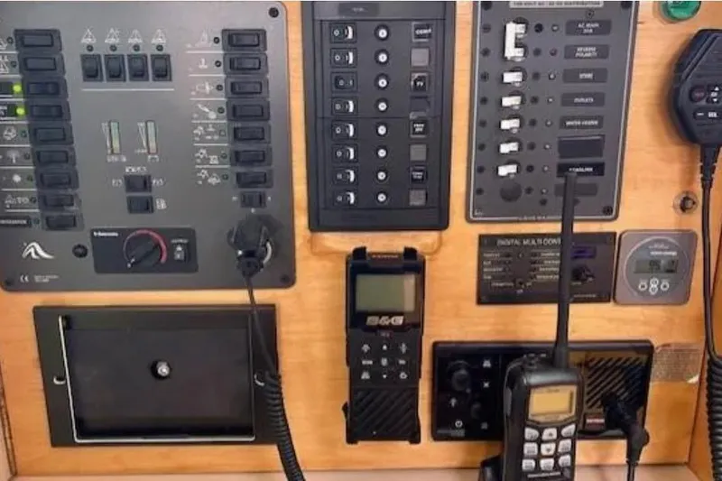 Slide: The Image of Control panel of a 2007 Hanse 400 yacht with navigation and communication equipment. - 23