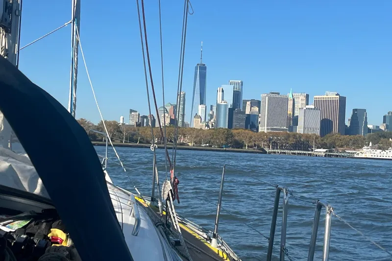 Slide: The Image of Sailing on a 2007 Hanse 400 with a city skyline view in the background. - 29