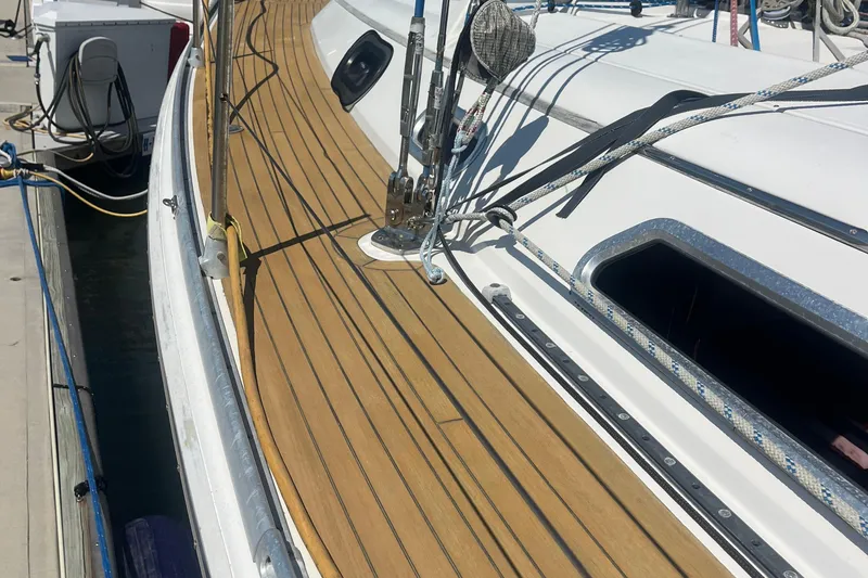 Slide: The Image of 2007 Hanse 400 sailboat deck with teak finish and rigging details. - 6