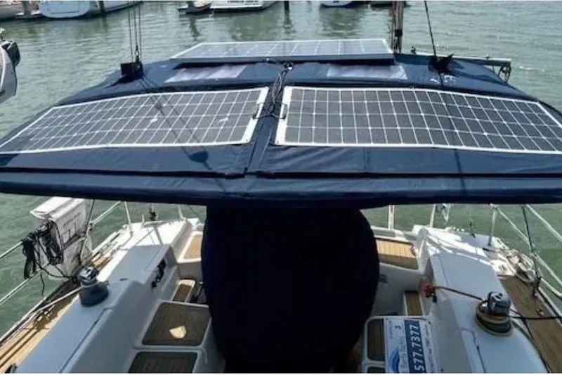 Slide: The Image of Hanse 400 yacht (2007) with solar panels on deck, docked at marina. - 7