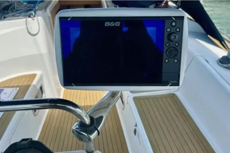 Slide: The Image of B&G navigation system on 2007 Hanse 400 yacht with teak deck background. - 9