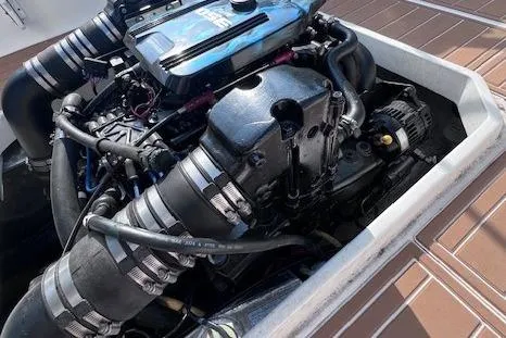 Slide: The Image of Engine of 2004 Hunt Yachts Surfhunter 25, showcasing detailed components and design. - 26