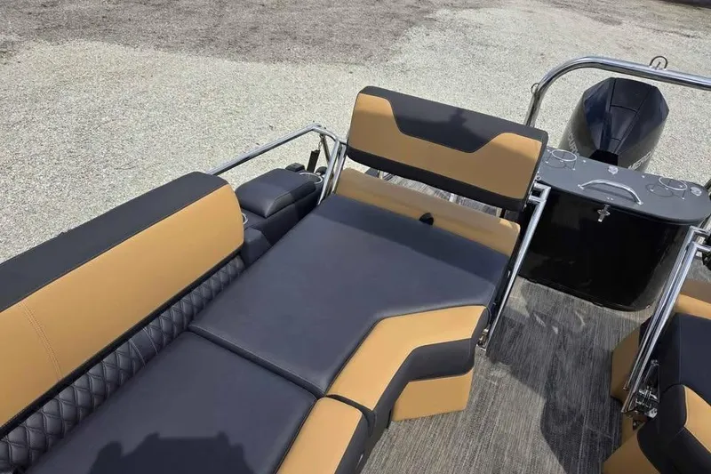 Slide: The Image of 2025 Avalon Catalina QUAD LOUNGER SHIFT boat interior with luxurious seating and modern design. - 9
