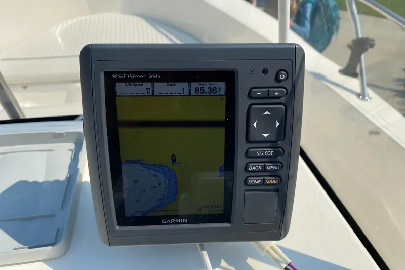 Slide: The Image of Garmin GPS on 2001 Boston Whaler 18 Dauntless boat, displaying navigation map. - 23