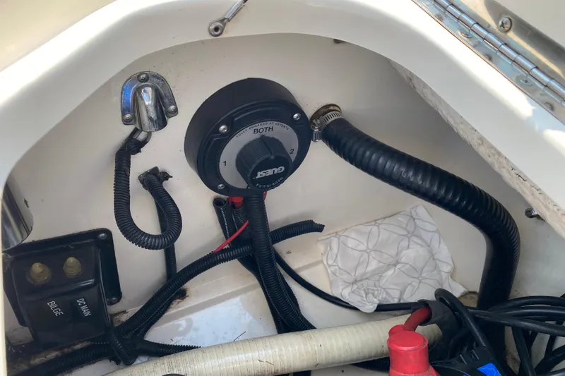 Slide: The Image of Control panel and wiring inside a 2001 Boston Whaler 18 Dauntless boat. - 39