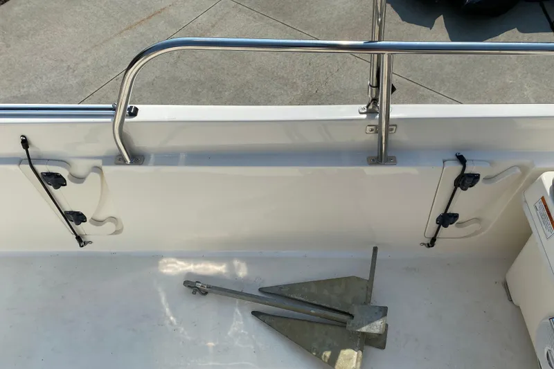 Slide: The Image of 2001 Boston Whaler 18 Dauntless boat interior with anchor and stainless steel railing. - 42