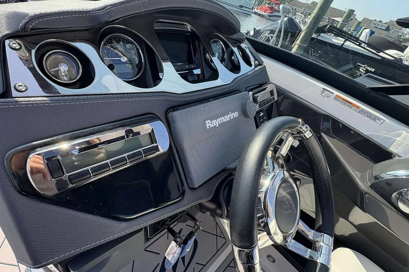 Slide: The Image of Dashboard of a 2017 Monterey 298SS boat with Raymarine navigation system. - 10