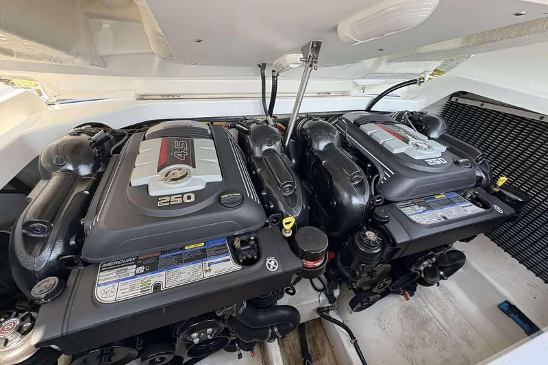 Slide: The Image of Twin Mercury 4.5L 250 engines in a 2017 Monterey 298SS boat engine compartment. - 13