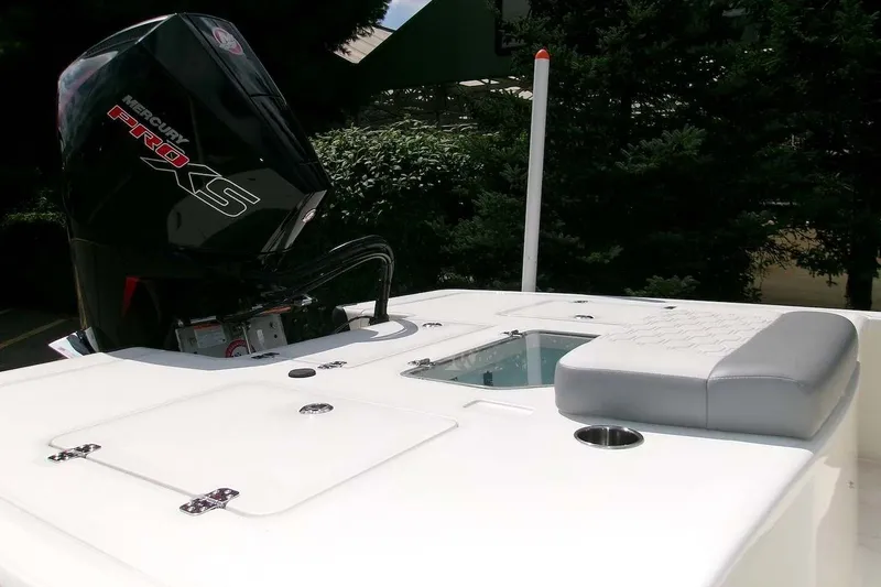 Slide: The Image of 2026 Mako 18 Pro Skiff boat with Mercury Pro XS engine, featuring a sleek deck design. - 4
