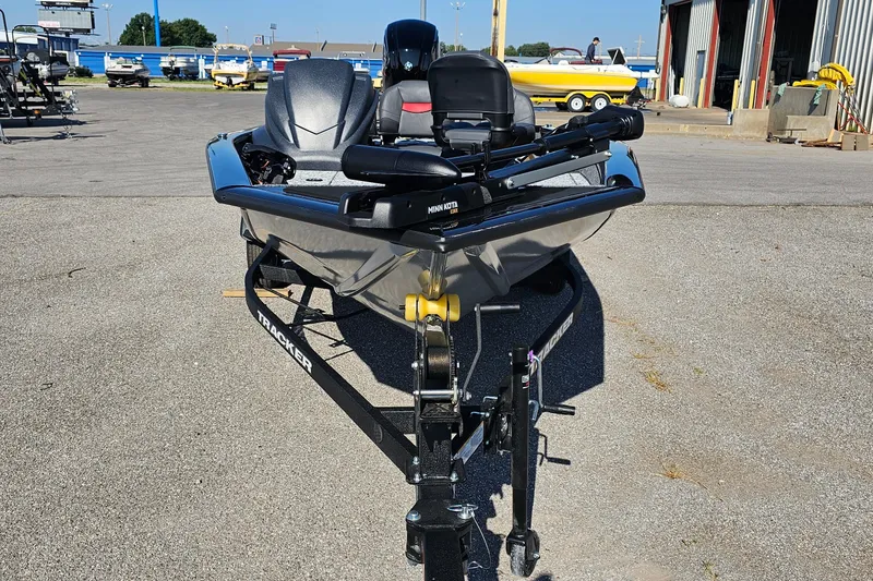 Slide: The Image of 2026 Tracker Pro Team 175 Crappie Edition boat on trailer, outdoor dealership setting. - 2