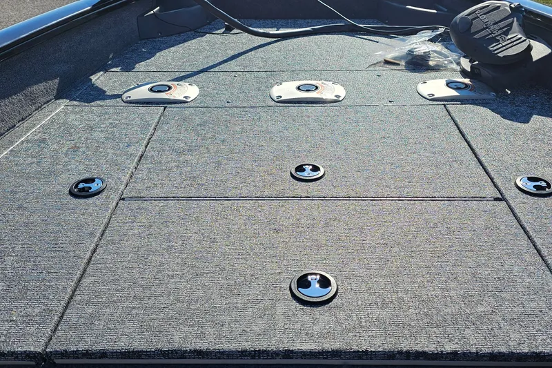 Slide: The Image of 2026 Tracker Pro Team 175 Crappie Edition boat deck with fishing seat mounts. - 6