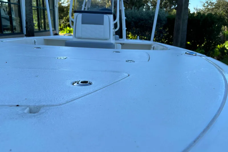 Slide: The Image of 2026 Mako 18 Pro Skiff boat deck, featuring sleek design and spacious seating. - 2