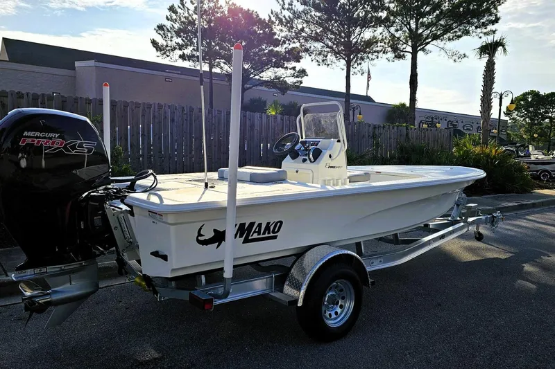 Slide: The Image of 2026 Mako 18 Pro Skiff boat on trailer, featuring Mercury Pro XS engine. - 3