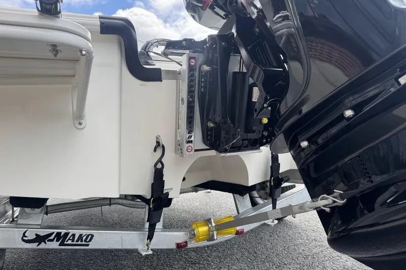 Slide: The Image of 2026 Mako 18 Pro Skiff boat trailer and motor detail, showcasing sturdy construction. - 10