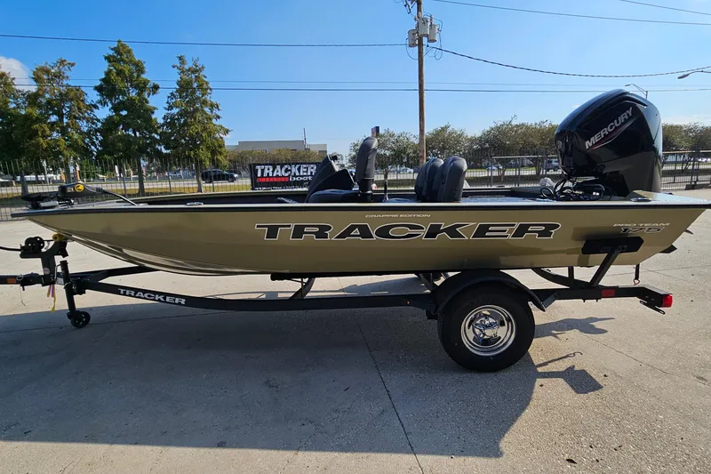 Slide: The Image of 2026 Tracker Pro Team 175 Crappie Edition boat on trailer, side view. - 5
