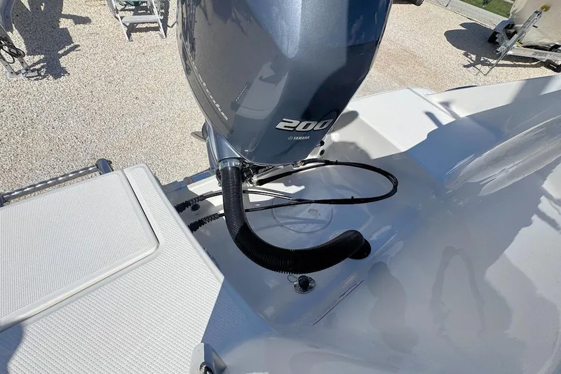 Slide: The Image of 2016 Robalo R222 Center Console with Yamaha 200 engine, rear deck view. - 7