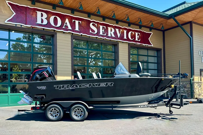 The Image of 2026 Tracker Targa V-19 WT boat on trailer outside boat service center. - 0