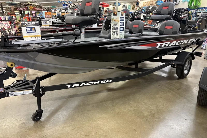 The Image of 2026 Tracker Pro Team 175 Crappie Edition boat displayed in a showroom. - 0