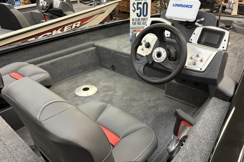 Slide: The Image of 2026 Tracker Pro Team 175 Crappie Edition boat interior with steering wheel and controls. - 3