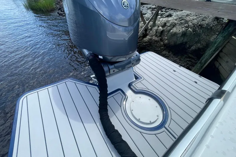Slide: The Image of 2021 Steiger Craft 255 Chesapeake boat with Yamaha outboard motor on deck. - 11
