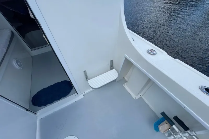 Slide: The Image of 2021 Steiger Craft 255 Chesapeake boat interior with step and storage area. - 13