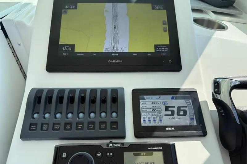 Slide: The Image of Steiger Craft 255 Chesapeake 2021 dashboard with Garmin navigation and Yamaha display. - 24