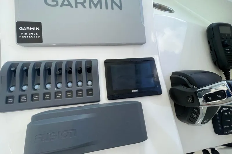 Slide: The Image of Control panel of a 2021 Steiger Craft 255 Chesapeake with Garmin and Yamaha electronics. - 35