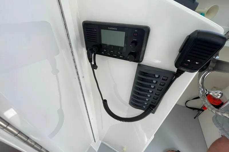 Slide: The Image of 2021 Steiger Craft 255 Chesapeake boat dashboard with Garmin marine radio equipment. - 36
