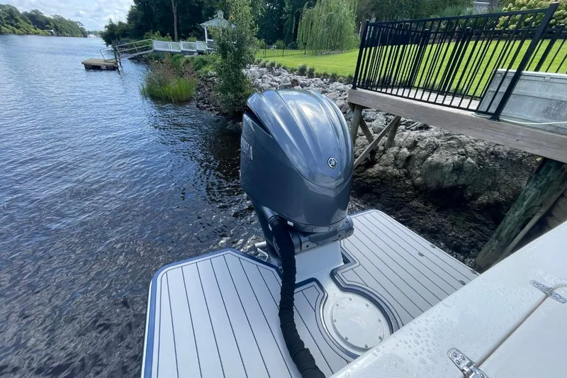 Slide: The Image of 2021 Steiger Craft 255 Chesapeake with Yamaha outboard motor on a calm river. - 9