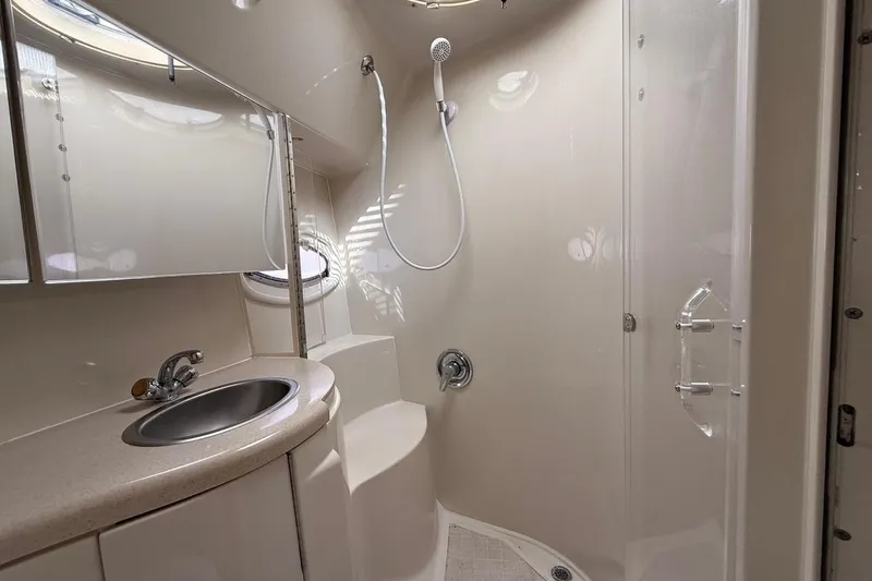 Slide: The Image of Bathroom interior of 2001 Regal Commodore 4160 yacht with shower and sink. - 18