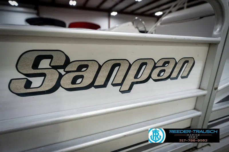 Slide: The Image of Interior of 1991 Godfrey Sanpan SP 2200 boat with carpeted flooring. - 47