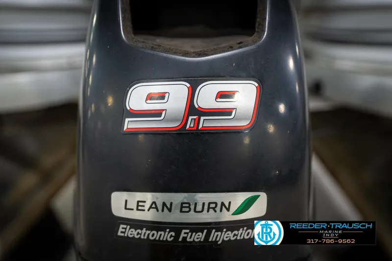 Slide: The Image of Close-up of a 1991 Godfrey Sanpan SP 2200 boat propeller, showing wear and detail. - 51