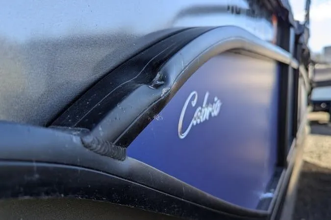 Slide: The Image of 2024 Barletta Cabrio 20UC boat close-up, highlighting sleek design and branding. - 11