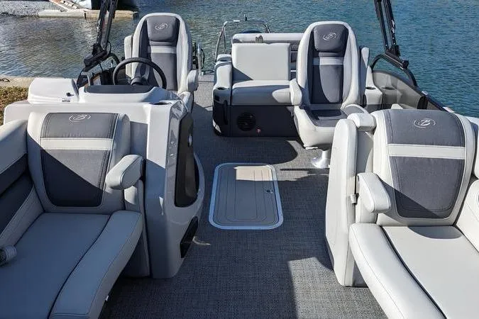 Slide: The Image of 2024 Barletta Cabrio 20UC pontoon boat interior with luxurious seating and modern design. - 8