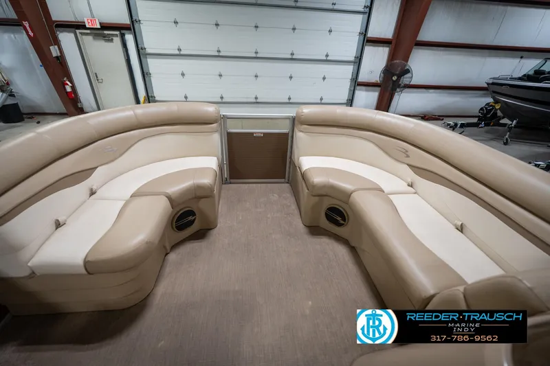Slide: The Image of Interior of a 2017 Bennington 18 SLX pontoon boat with beige seating. - 20