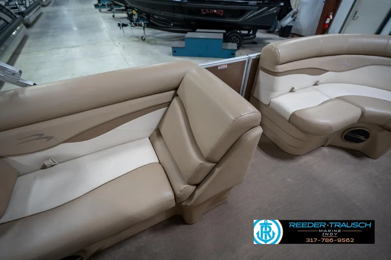 Slide: The Image of 2017 Bennington 18 SLX boat interior with beige seating at Reeder Trausch Marine. - 22