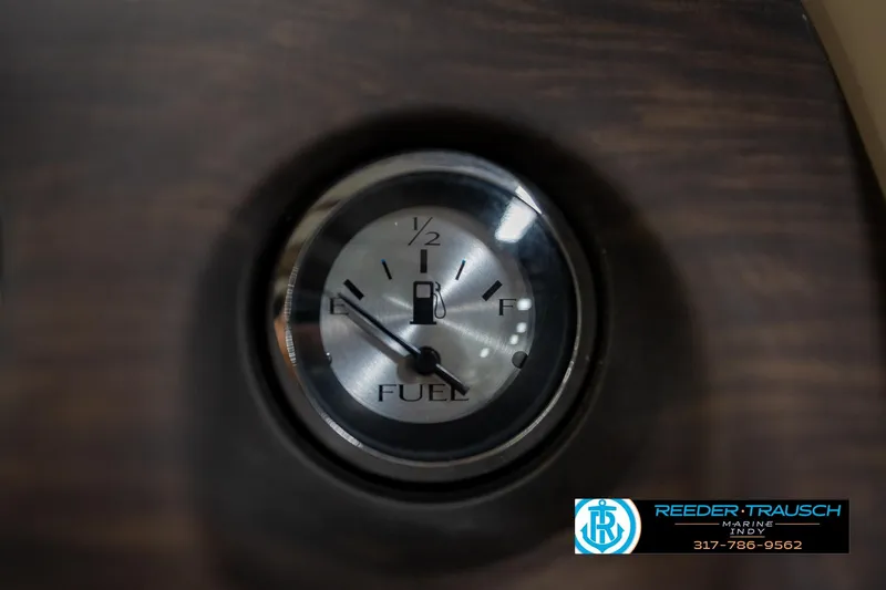 Slide: The Image of Fuel gauge of a 2017 Bennington 18 SLX boat, showing near empty. - 35