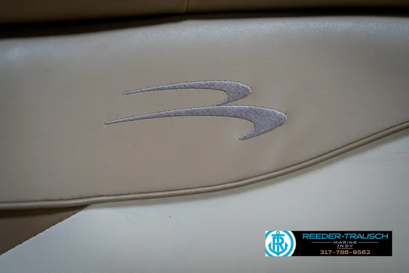 Slide: The Image of Beige interior of 2017 Bennington 18 SLX with embroidered logo detail. - 40