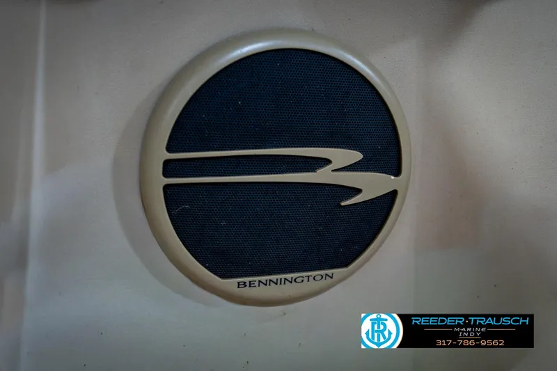 Slide: The Image of Speaker grille on a 2017 Bennington 18 SLX boat, featuring the Bennington logo. - 43
