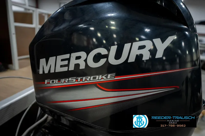 Slide: The Image of Mercury FourStroke engine on 2017 Bennington 18 SLX boat, Reeder-Trausch Marine logo visible. - 48