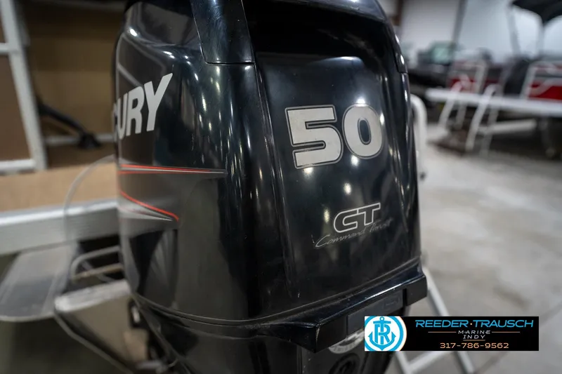 Slide: The Image of Mercury 50 HP outboard motor on 2017 Bennington 18 SLX boat, indoor setting. - 49