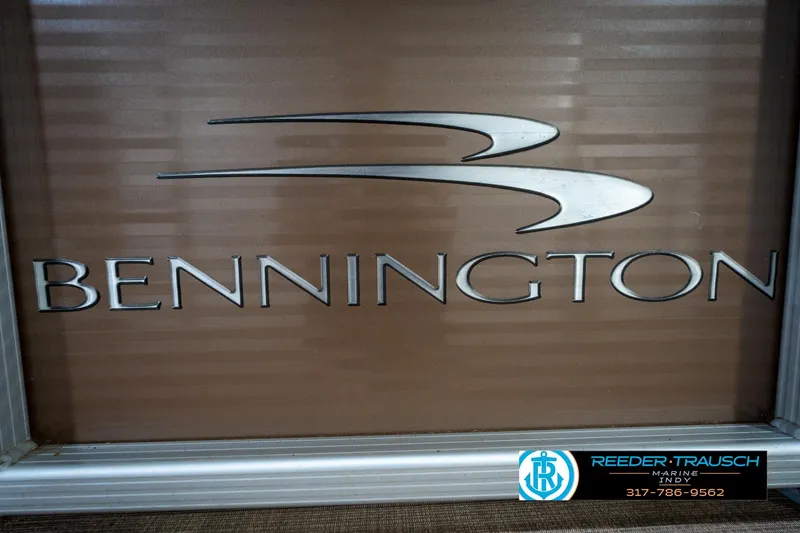 Slide: The Image of Bennington 18 SLX 2017 logo on brown background, Reeder-Trausch Marine contact details. - 53