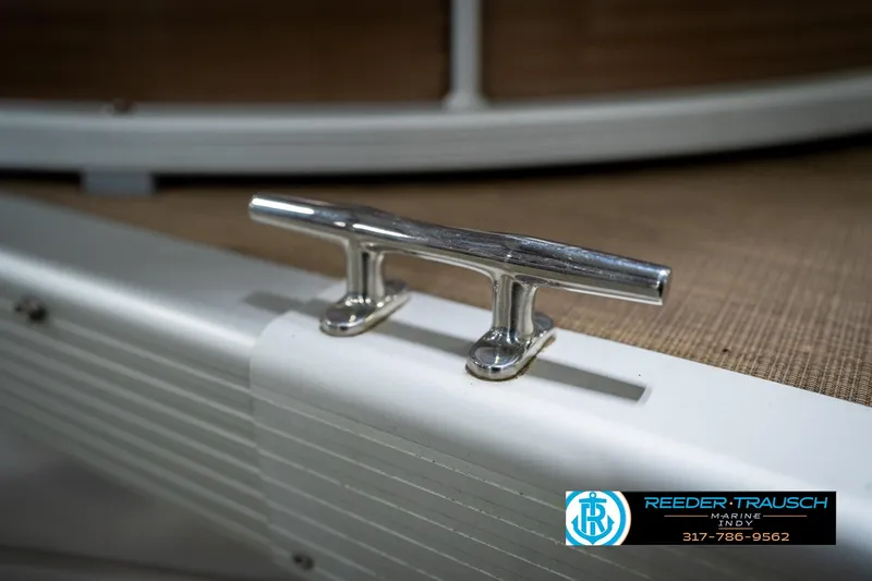 Slide: The Image of Chrome cleat on 2017 Bennington 18 SLX boat, Reeder Trausch Marine logo visible. - 55