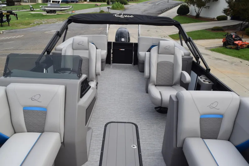 Slide: The Image of 2025 Qwest L-Class 822 RLS pontoon boat with luxurious seating and modern design. - 12