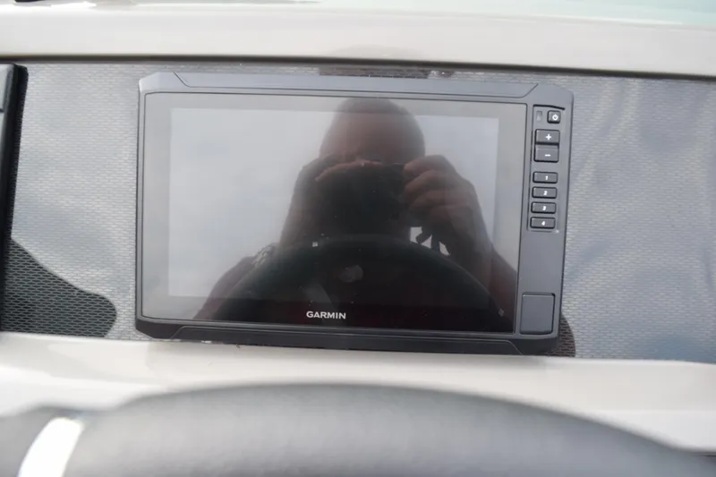 Slide: The Image of Garmin display on 2025 Qwest L-Class 822 RLS dashboard, reflecting photographer. - 31