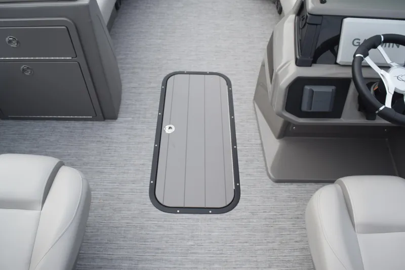 Slide: The Image of Interior of 2025 Qwest L-Class 822 RLS boat, featuring sleek seating and control panel. - 33