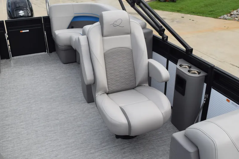 Slide: The Image of Luxurious seating on 2025 Qwest L-Class 822 RLS pontoon boat with cup holders. - 39