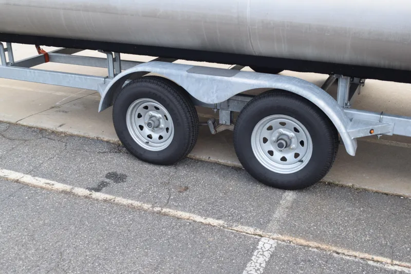 Slide: The Image of Trailer wheels of 2025 Qwest L-Class 822 RLS on pavement. - 46