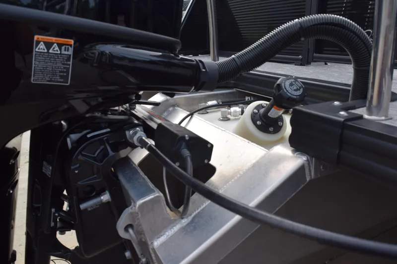 Slide: The Image of Close-up of 2025 Qwest L-Class 822 RLS boat engine components and wiring. - 9